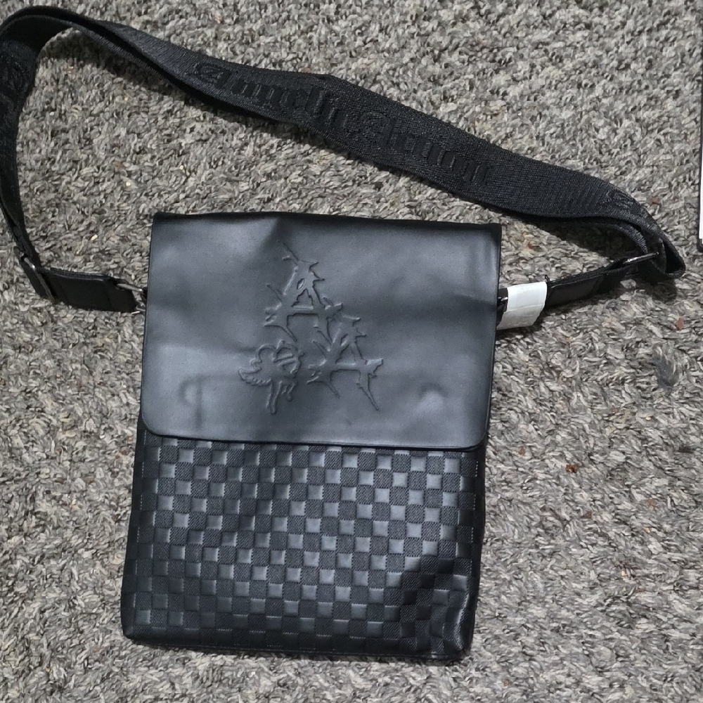 ** Black Embossed Crossbody Bag